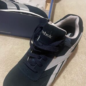 Reebok Men's Dark Blue and White Steel Toe shoes.